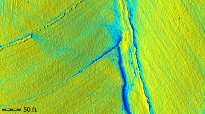 Water flow on patched DEM showing pooling effects around discontinuities