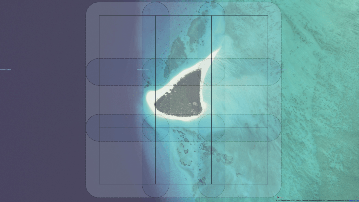 Image over island showing grid of 9 for spliting an aerial dataset shown with overlap