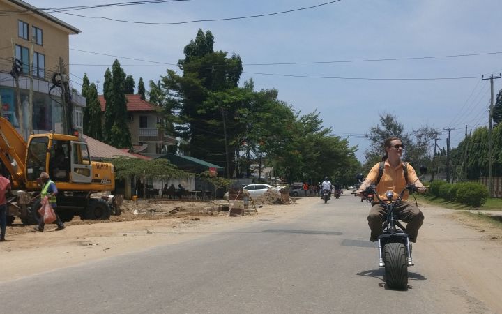 Electric bike ride to Tanzania Flying Labs, photo credit Frederick Mbuya